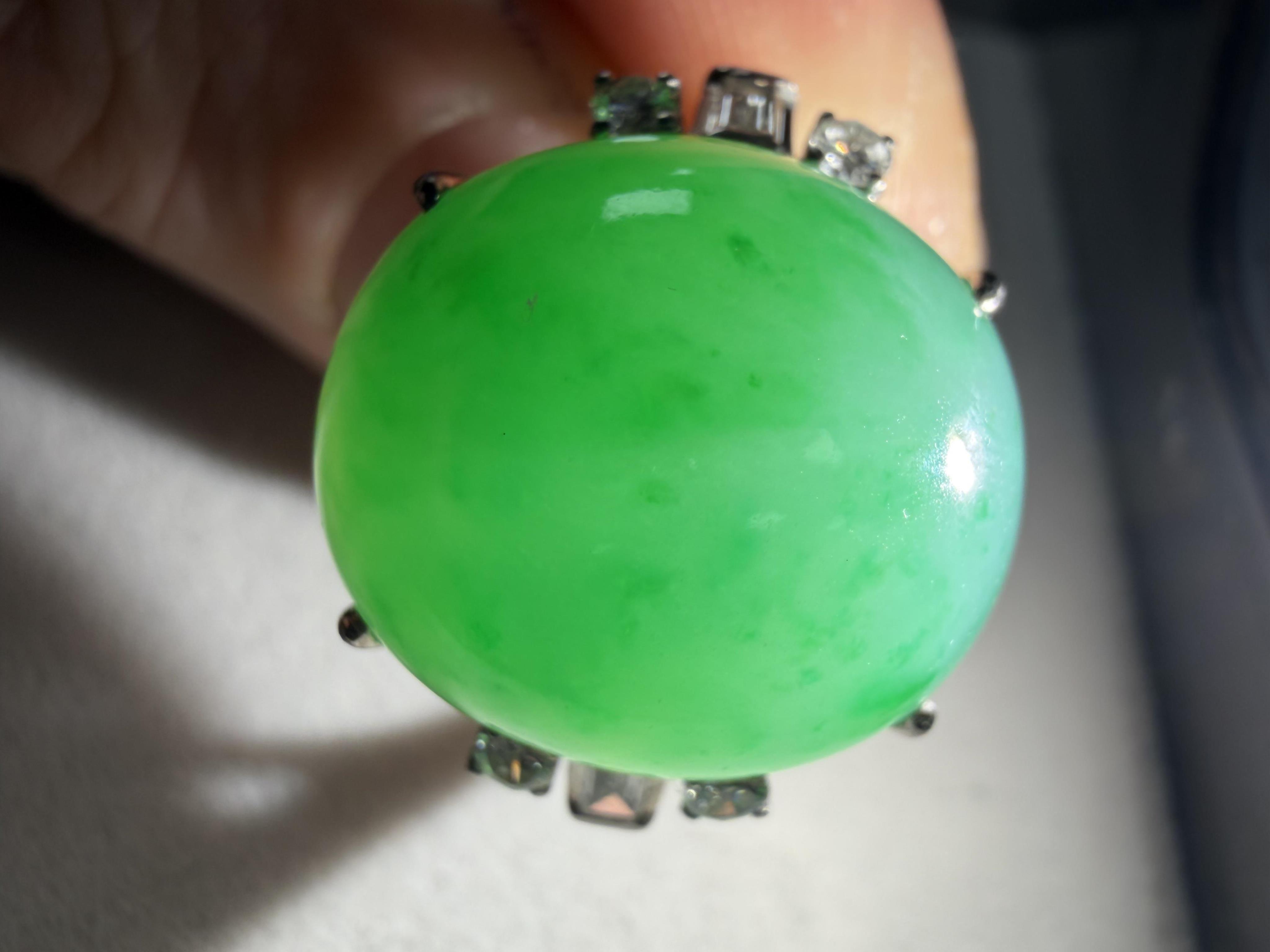 A jadeite and diamond ring